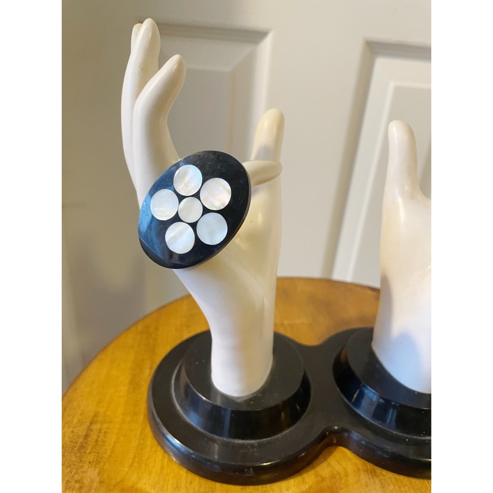 Black and white plastic ring